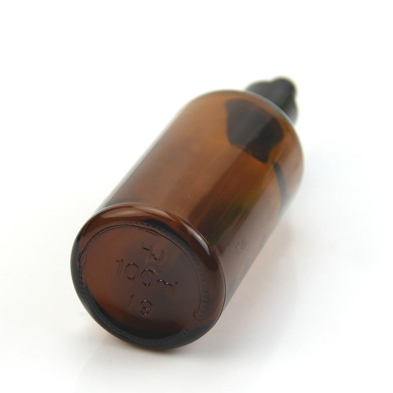 Brown dispensing lotion cosmetic essential oil bottle